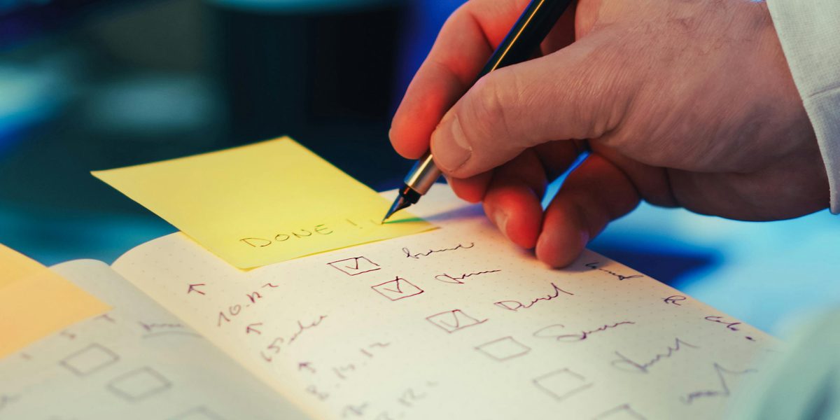 A person visually representing the act of balancing multiple complex factors—cost, time, and academic fit—for a crucial decision.
