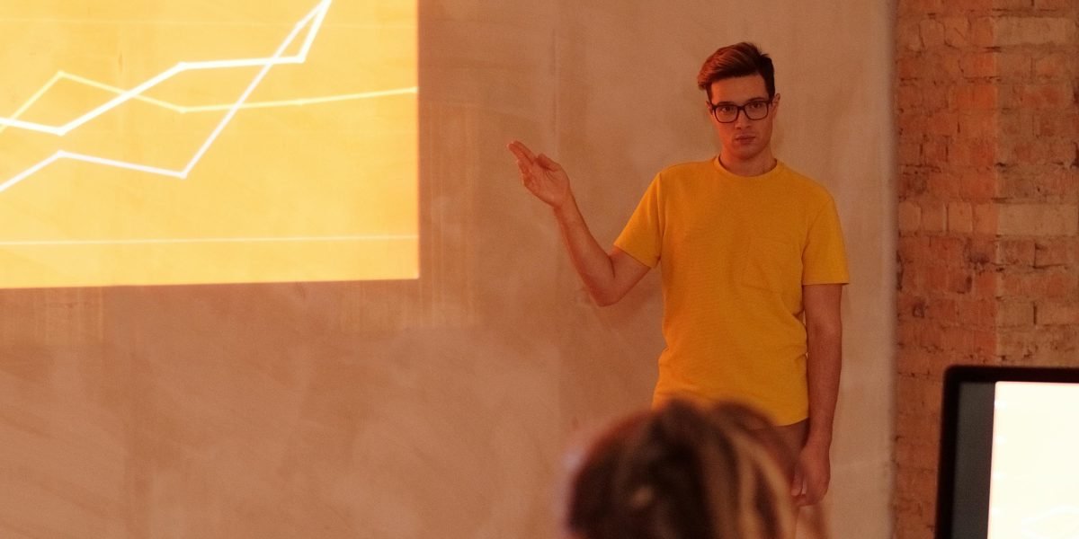 A confident student standing proudly, ready to present their project findings to an audience.