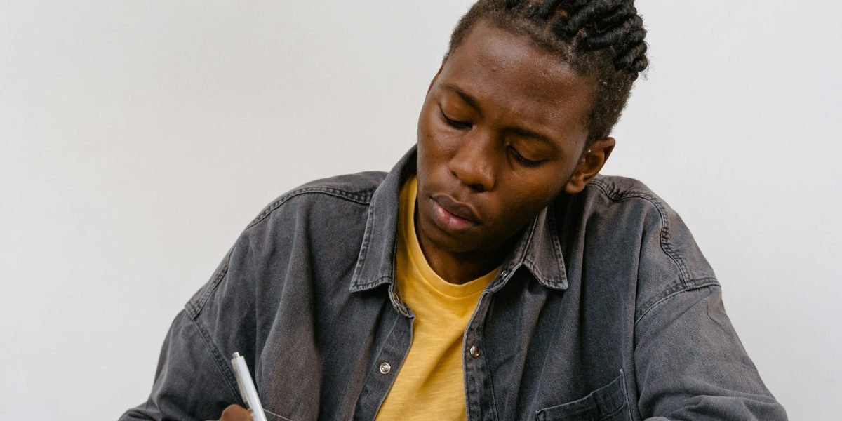 A person demonstrating deep concentration and engagement while studying, applying effective learning techniques.