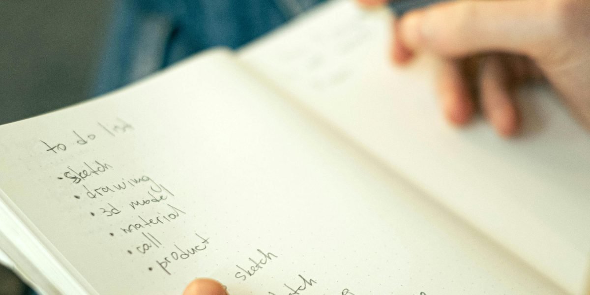 A person thoughtfully making a decision or planning their next steps, symbolizing goal setting and strategic course selection.