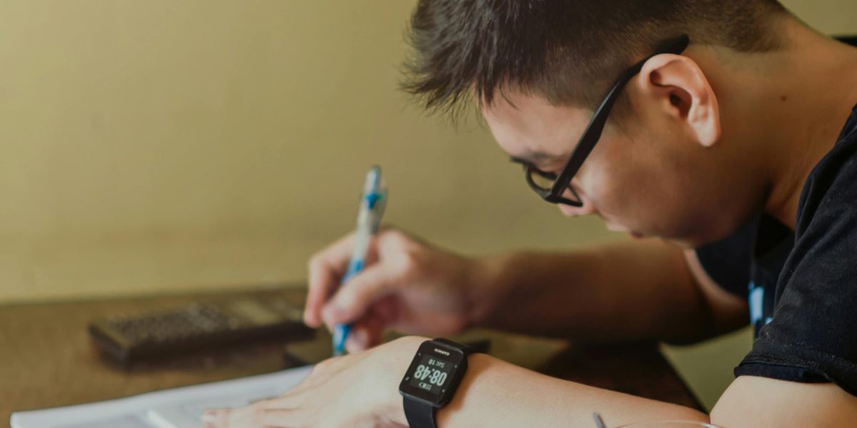 A student engaged in learning, representing the initial stages of a psychology degree.