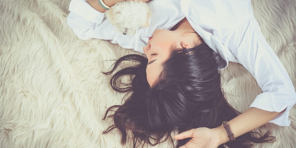 A person sleeping peacefully, symbolizing the crucial role of sleep in memory consolidation and effective learning.