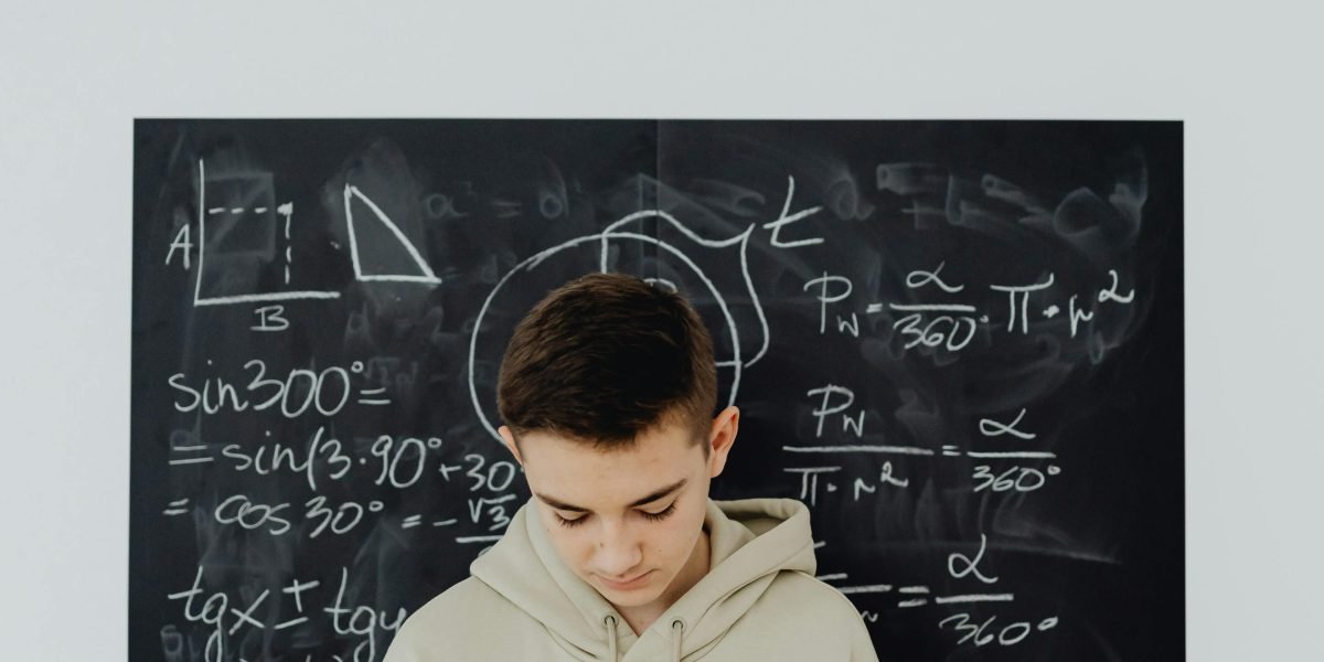 A person in deep thought, demonstrating the cognitive effort involved in active problem-solving and inquiry.