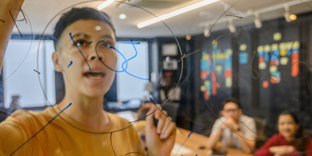 Someone actively engaged in problem-solving, symbolizing the computational thinking skills developed in computer science.