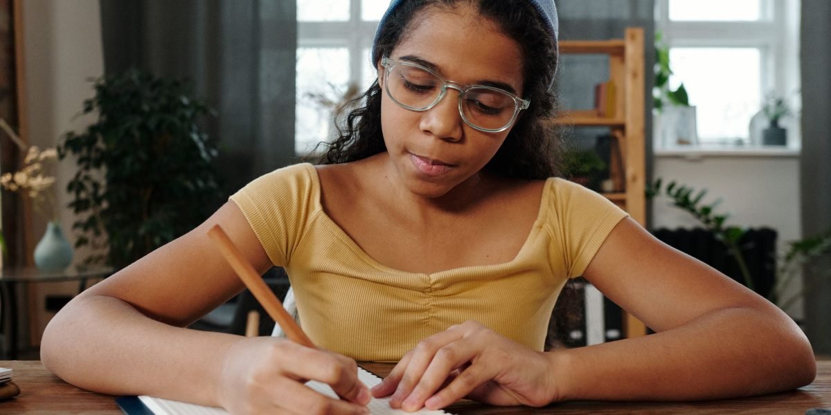 A person deeply focused on their work or studies, demonstrating concentration and efficient management of information.