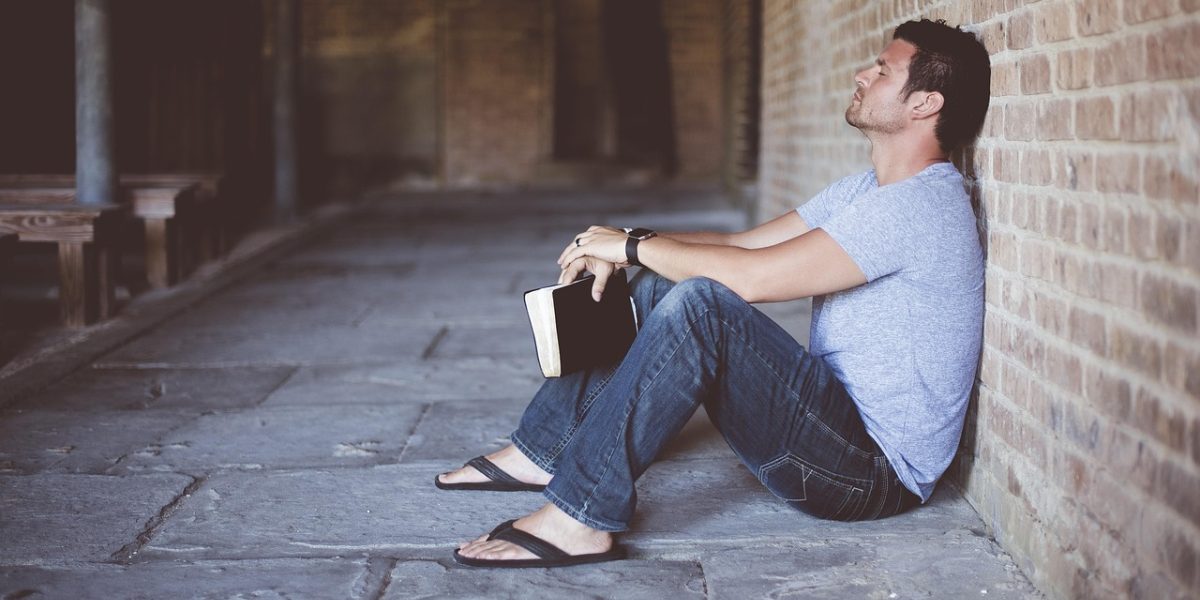 A person engaged in deep thought, reflecting the analytical nature of INTPs.