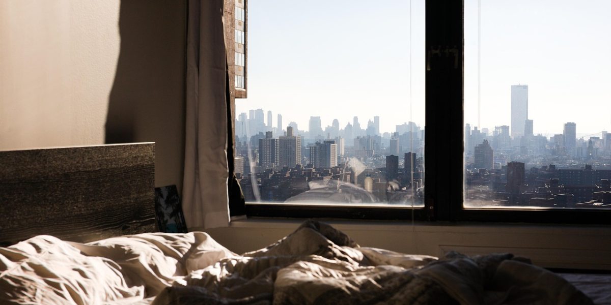 A serene bedroom environment emphasizes the critical role of quality sleep in memory consolidation and effective learning.