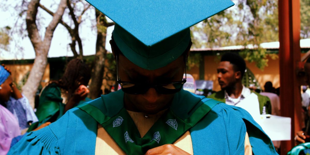 The joyful moment of celebrating an academic milestone, symbolizing the successful completion of an online degree.